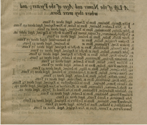 Color photograph of black ink printed text on paper discolored with age.